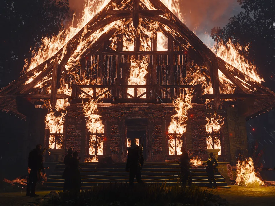 A burning building during a story quest in an official Remastered screenshot